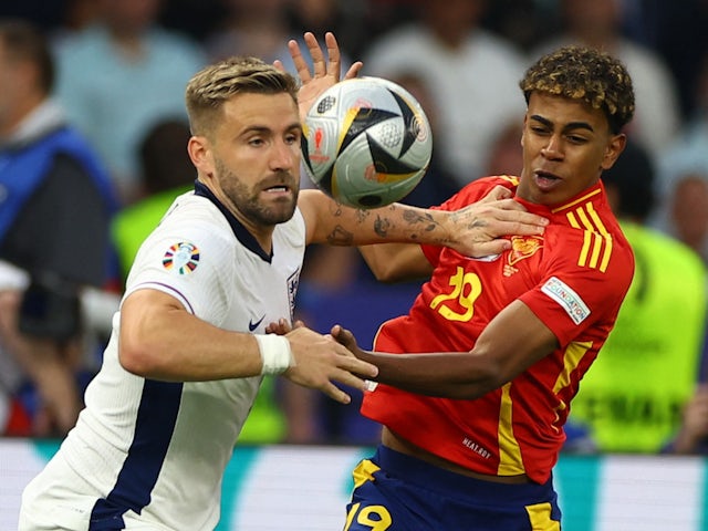 Spain's Lamine Yamal in action with England's Luke Shaw on July 14, 2024