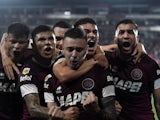 Lanus players celebrates a goal versus Cluyb Racing in June 2024