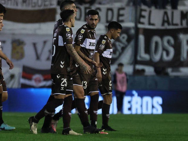 Platense players look on in 2024