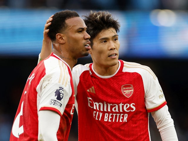 Arsenal's Gabriel and Takehiro Tomiyasu after the match on March 31, 2024