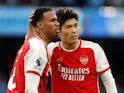 Arsenal's Gabriel and Takehiro Tomiyasu after the match on March 31, 2024