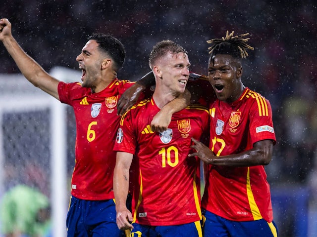 Spain's Dani Olmo celebrates scoring with Nico Williams and Mikel Merino on June 30, 2024