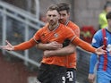 Louis Moult of Dundee United celebrates on March 23, 2024