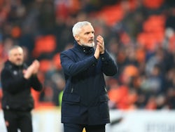 Dundee United manager Jim Goodwin applauds the fans on March 9, 2024