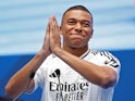 Real Madrid's Kylian Mbappe acknowledges the crowd during his presentation as a new signing on July 16, 2024