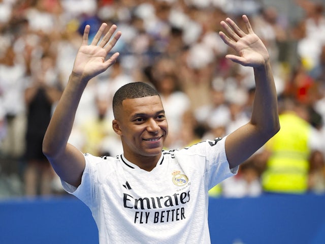 Real Madrid's Kylian Mbappe acknowledges the crowd during his presentation as a new signing on July 16, 2024