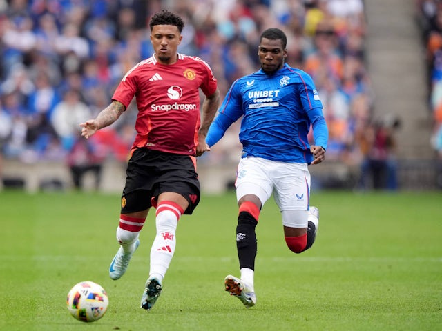 Rangers' Dujon Sterling in action with Manchester United's Jadon Sancho on July 20, 2024