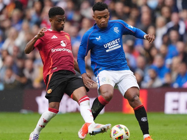 Rangers' Oscar Cortes in action with Manchester United's Amad Diallo on July 20, 2024