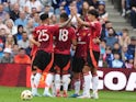 Manchester United players celebrate Amad Diallo's goal against Rangers on July 20, 2024