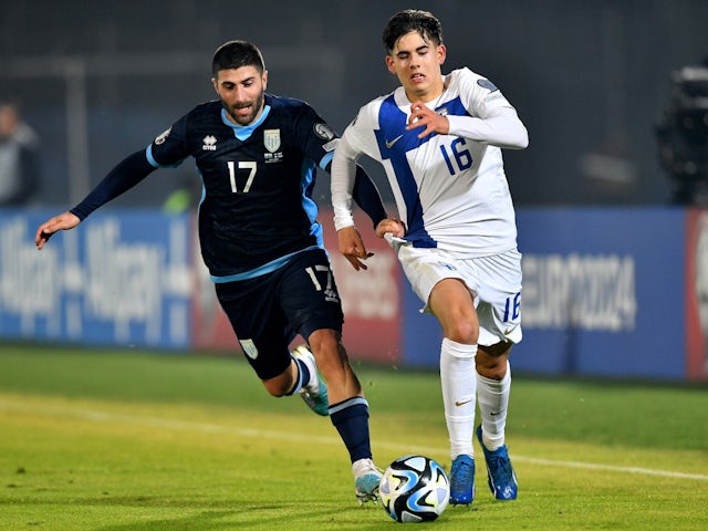 Finland's Tomas Galvez in action with San Marino's Alessandro Golinucci on November 20, 2023