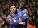 Liverpool's Trent Alexander-Arnold and Ibrahima Konate celebrate their first goal on January 7, 2024