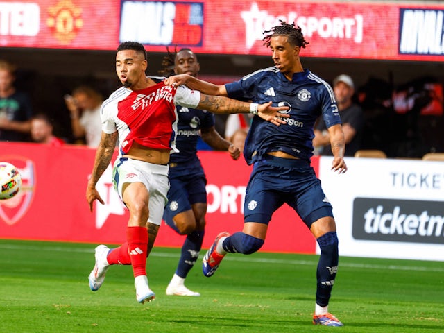 Manchester United's Leny Yoro in action with Arsenal's Gabriel Jesus on July 27, 2024