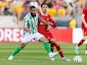 Liverpool's Curtis Jones in action with Real Betis' Nabil Fekir on July 26, 2024
