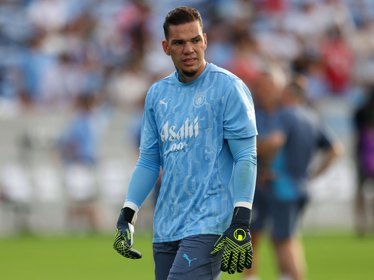 Ederson warming up for Manchester City.