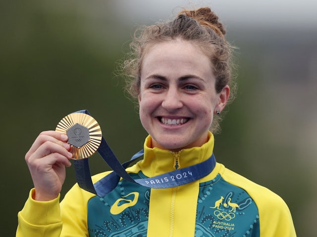 Gold medalist Grace Brown of Australia poses on the podium after the Women's Individual Time Trial on July 27, 2024