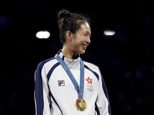 Gold medalist Man Wai Vivian Kong of Hong Kong celebrates with her medal in the Women's Epee Fencing on July 27, 2024