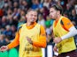 Manchester City midfielder Kalvin Phillips (4) and Manchester City midfielder Jack Grealish (10) warming up during the Premier League match on July 27, 2024