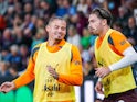 Manchester City midfielder Kalvin Phillips (4) and Manchester City midfielder Jack Grealish (10) warming up during the Premier League match on July 27, 2024