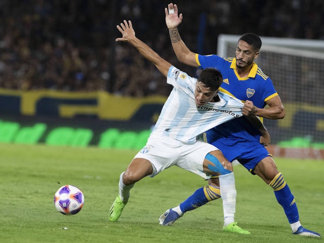 Mateo Coronel of Atletico Tucuman fight for possession against Boca Juniors on January 29, 2023