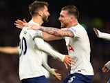 Tottenham Hotspur's Pierre-Emile Hojbjerg celebrates with Rodrigo Bentancur after scoring their second goal on October 15, 2022