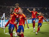 Spain players celebrate a goal against England on July 14, 2024