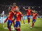 Spain players celebrate a goal against England on July 14, 2024