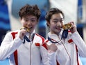 Gold medallists Yani Chang of China and Yiwen Chen of China pose with their medals on July 27, 2024