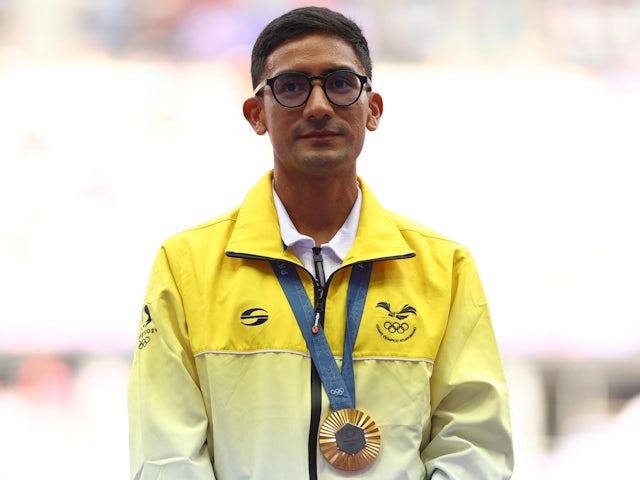 Gold medallist Brian Daniel Pintado of Ecuador stands on the podium with his medal on August 2, 2024