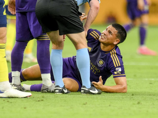 Cesar Araujo of Orlando City on the ground injured on July 17, 2024