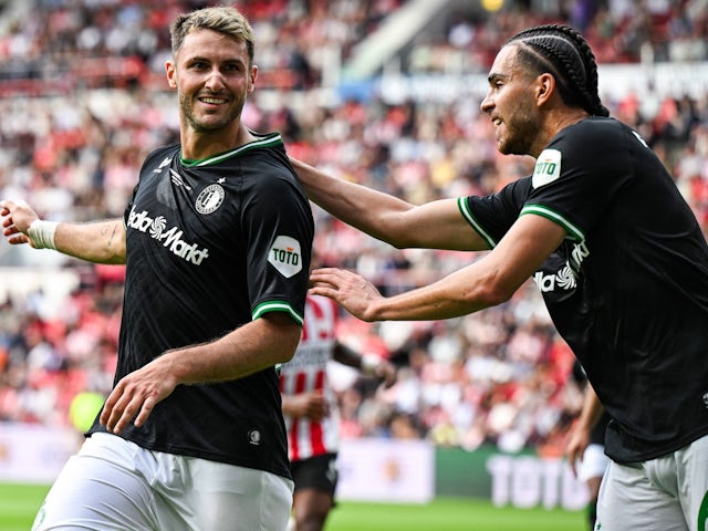 Santiago Gimenez of Feyenoord and Ramiz Zerrouki of Feyenoord celebrate the 1:1 during the 28th edition of the Johan Cruijff Scale between PSV Eindhoven and Feyenoord at Phillips Stadium on August 4, 2024