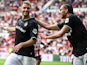 Santiago Gimenez of Feyenoord and Ramiz Zerrouki of Feyenoord celebrate the 1-1 during the 28th edition of the Johan Cruijff Scale between PSV Eindhoven and Feyenoord at the Phillips stadium on August 4, 2024 on August 4, 2024