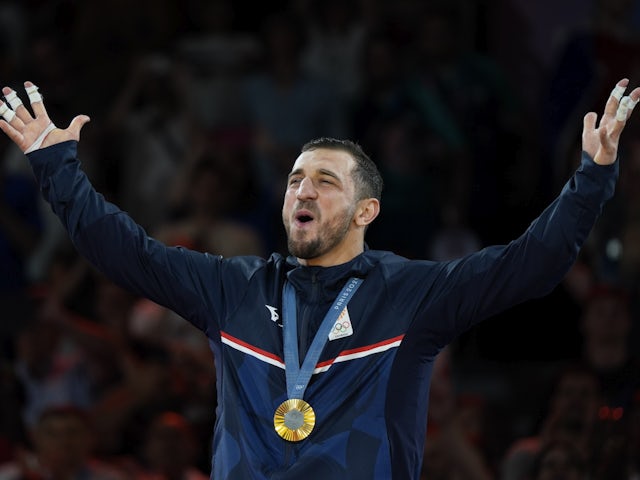 Gold medalist Lasha Bekauri (GEO) celebrates after the men's judo 90kg final during the Paris 2024 Olympic Summer Games on July 31, 2024