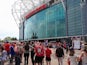 Fans gather outside Old Trafford Stadium on July 28, 2024