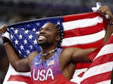 Noah Lyles of United States celebrates after winning gold on August 4, 2024