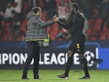 ANTONIO CONTE and player ROMELU LUKAKU celebrate a victory on July 28, 2024