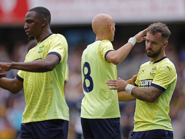 Southampton's Adam Armstrong celebrates scoring their first goal with teammates on August 3, 2024