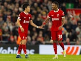 Wataru Endo celebrates with Ryan Gravenberch after scoring Liverpool's second goal on October 26, 2023