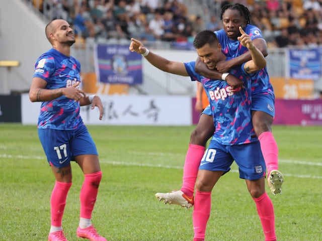 Kitchee player 90 Soares Belitardo Junior, Walter (aka. Juninho) celebrates with teammates on November 27, 2023