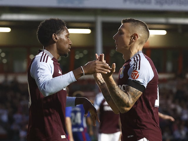 Aston Villa's Jaden Philogene celebrates scoring their second goal with Lucas Digne on August 7, 2024