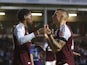 Aston Villa's Jaden Philogene celebrates scoring their second goal with Lucas Digne on August 7, 2024