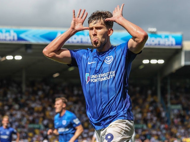 Callum Lang celebrates scoring Portsmouth's third goal on August 10, 2024