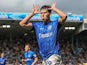 Callum Lang celebrates scoring Portsmouth's third goal on August 10, 2024