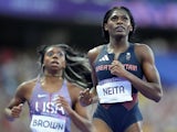 Team GB's Daryll Neita and USA's Brittany Brown react after the women's 200m semi-final at the Paris 2024 Olympics on August 5, 2024