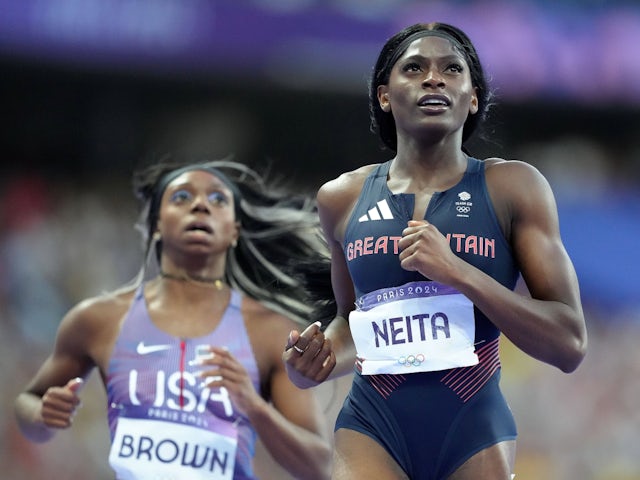 Team GB's Daryll Neita and USA's Brittany Brown react after the women's 200m semi-final at the Paris 2024 Olympics on August 5, 2024