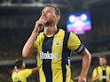 Fenerbahce's Edin Dzeko celebrates scoring in a Champions League second qualifying round match against Lugano July 30, 2024