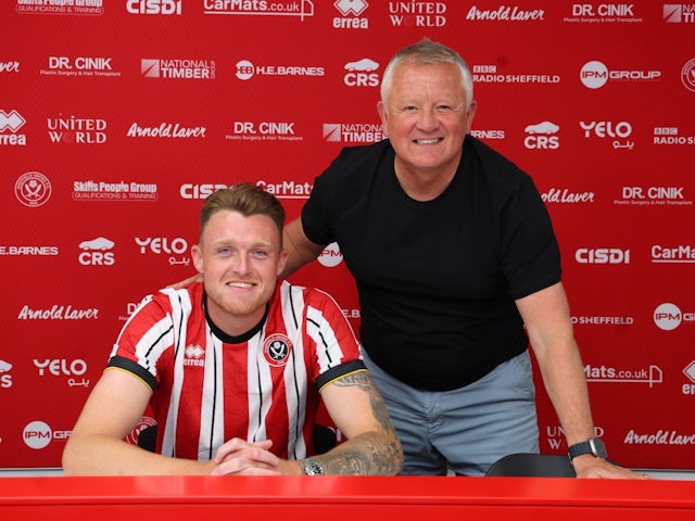 Harry Souttar pictured with manager Chris Wilder after joining Sheffield United on August 6, 2024