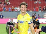  Crystal Palace defender Joachim Andersen (5) smiles while holding the Stateside Cup trophy following the Stateside Cup match between West Ham United and Crystal Palace FC on Saturday, August 3, 2024 [on August 9, 2024]