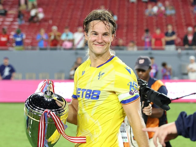  Crystal Palace defender Joachim Andersen (5) smiles while holding the Stateside Cup trophy following the Stateside Cup match between West Ham United and Crystal Palace FC on Saturday, August 3, 2024 [on August 9, 2024]