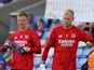 Arsenal goalkeepers Karl Hein and Aaron Ramsdale warm up ahead of the match on August 21, 2023