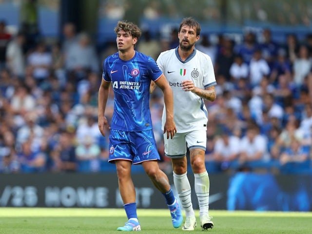 Marc Guiu of Chelsea and Francesco Acerbi of Inter Milan on August 11, 2024